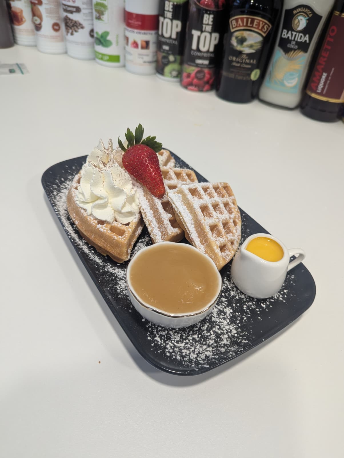 Americano waffles with cream & caramel sauce